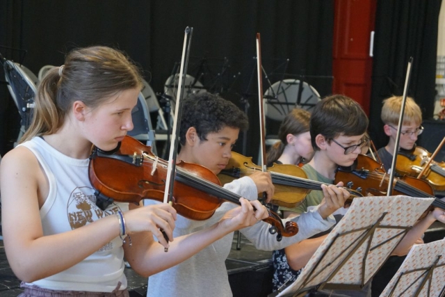 a group of young string players