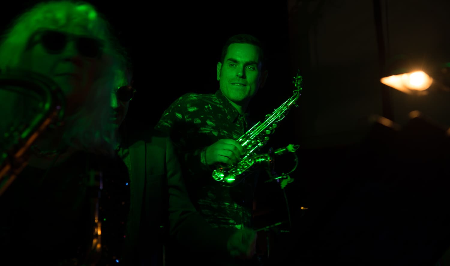 a musician with a saxophone